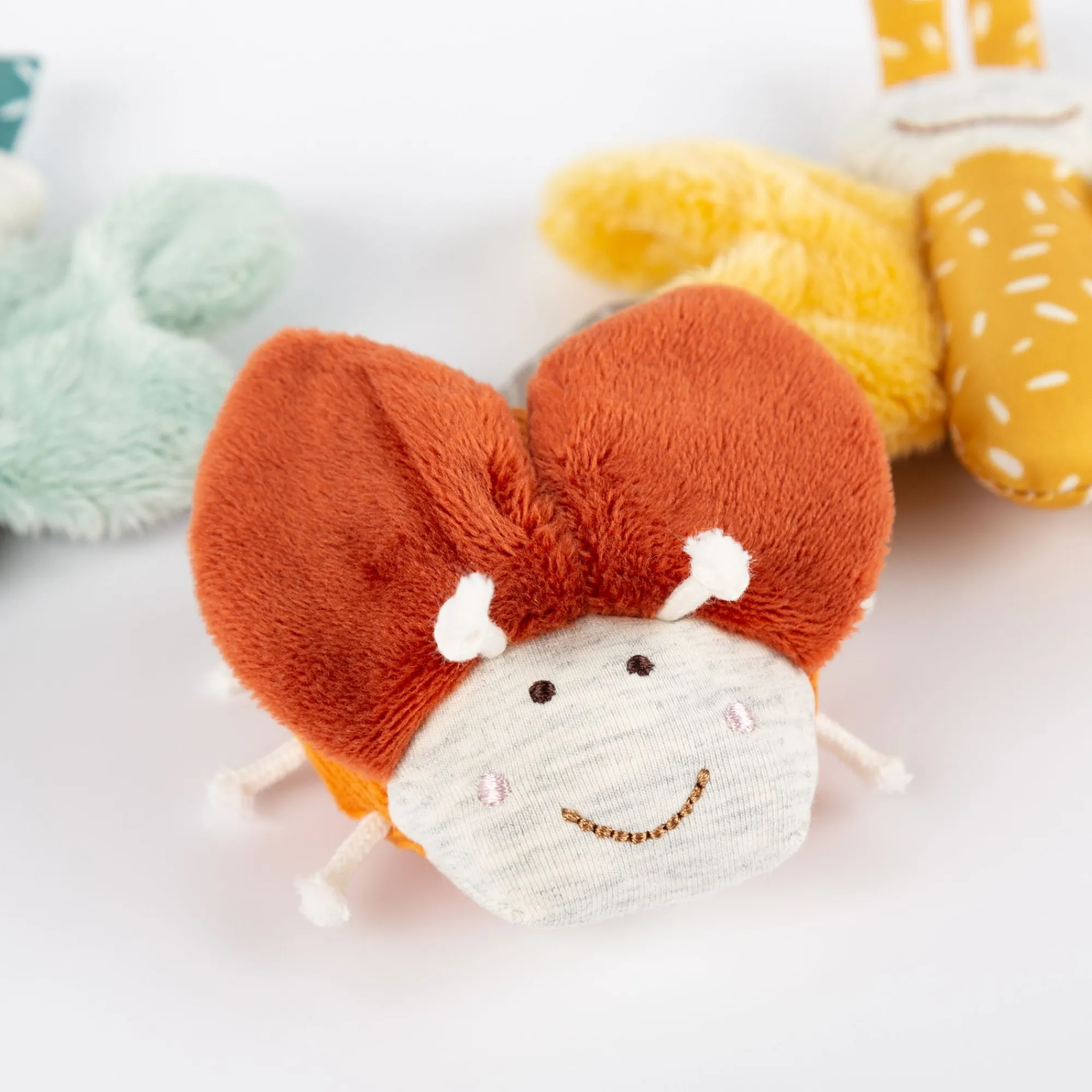 Sigikid Babyspielzeug|Kinderwagenkette Schmetterling