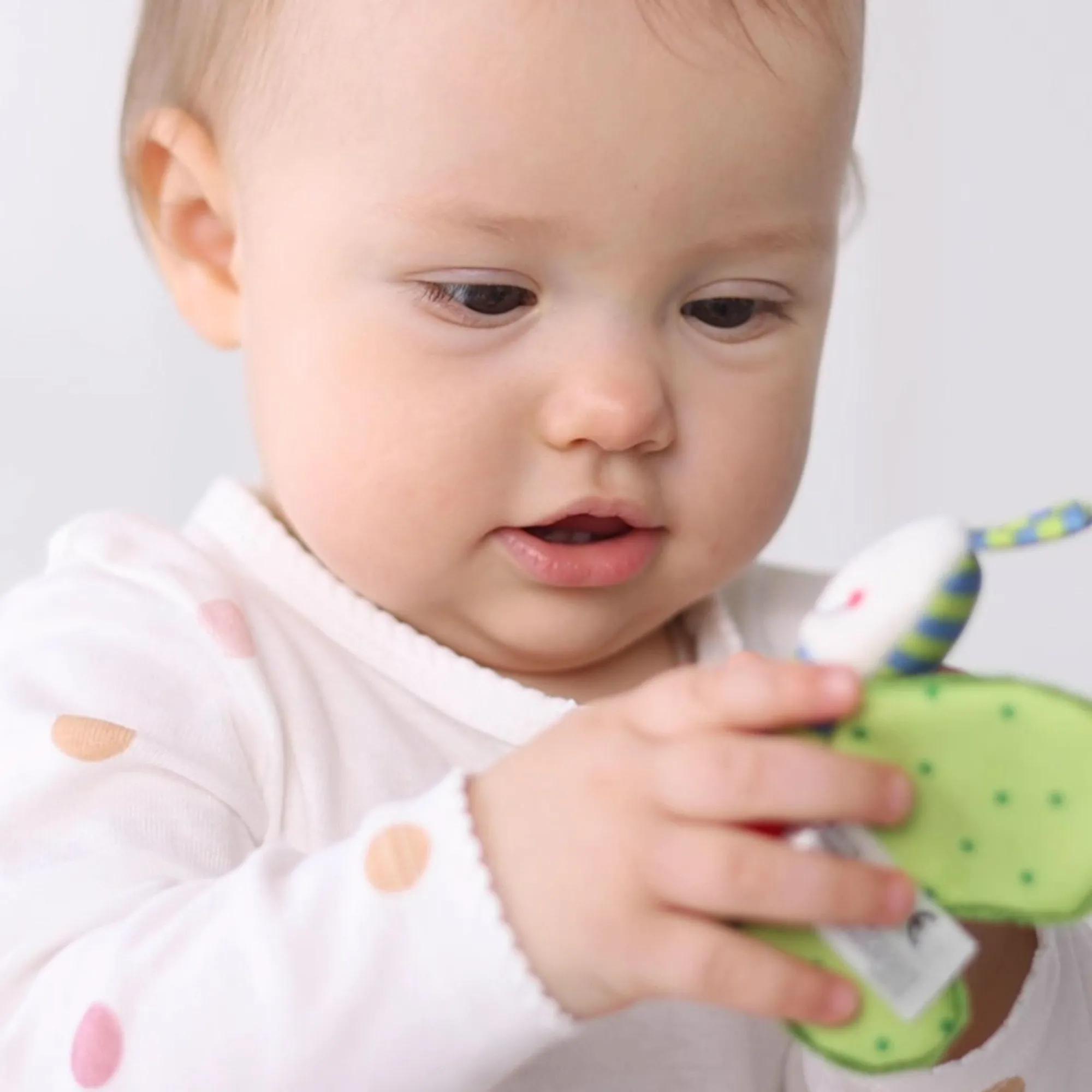 Sigikid Babyspielzeug|Schmetterling Grun, Red Stars
