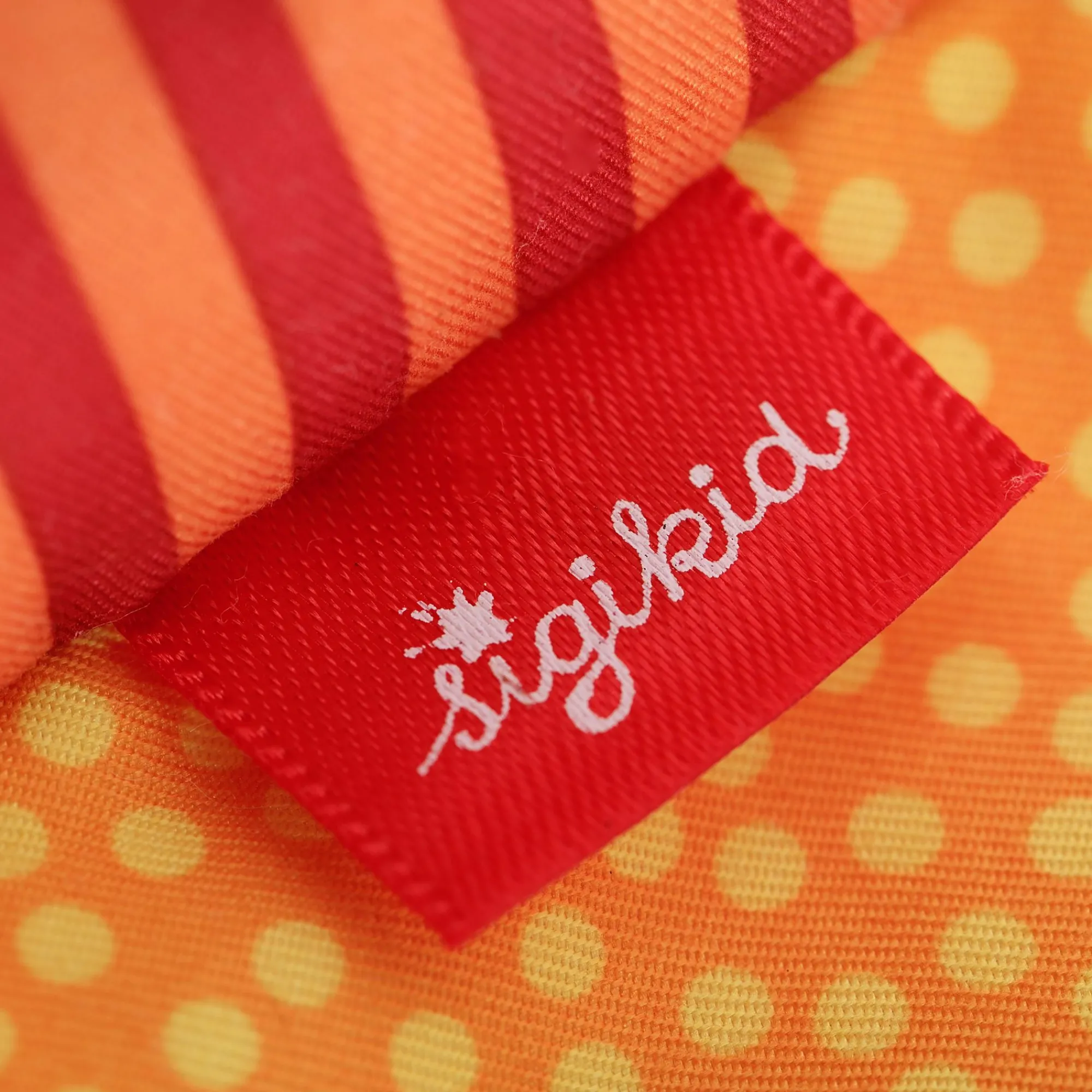 Sigikid Babyspielzeug|Schmetterling Orange, Red Stars